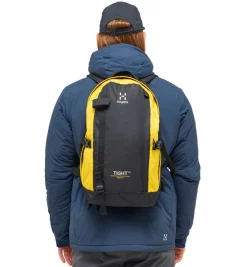 Haglöfs Rygsække|Tasker Og Rygsække-Tight Medium Rygsæk, True Black / Bright Yellow True Black / Bright YellowVolume: ca. 20 literMål: (højde x dybde x bredde): 50x23x29 cmVægt: ca. 525 gDen populære Tight rygsæk fra Haglöfs er tilbage i en opdateret version. Haglöfs kombinerer genanvendte materialer med et markant, ikonisk design.De dråbeformede for- og sidepaneler sikrer et lavt tyngdepunkt, hvilket gør den anvendelig til alle former for aktiviteter. Som navnet Tight hentyder – sidder den helt tæt om din ryg takket være de formede stropper og det ergonomisk formede rygpanel. Udstyret med ekstra bærepunkter, smarte funktioner og justeringsmuligheder.Masser af anvendelsesmuligheder: Udviklet som outdor dagstursrygsæk, rigtig fin til hverdagsbrug og populær til studie- og skolebrug.Specifikationer:- 100 % genanvendt hovedbestanddel, vejrbestandigt og meget holdbart stof- Dråbeformet forside og sidepaneler for et lavt tyngdepunkt- Anatomisk formede skulderremme- En inderlomme med lynlås- En lynlåslomme med let adgang foran- Aftageligt isøksefæste- Reflekslogoer sikrer, at du kan ses- Kompressionsremme i siden for at sikre indholdet- Justerbart hoftebælte, aftageligt- Justerbar brystrem, der giver bedre komfort, når du går- Håndtag i toppen, der er let at gribe fat i- Nøgleholder- Overfladerne er imprægneret med DWR uden fluorocarbon: hjælper med at holde vand og smuds borteDetaljer